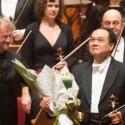 Robert Chen, Chicago Symphony Orchestra concertmaster, acknowledges applause for his Taipei performance of Mendelssohn Violin Concerto with CSO on Asia tour 2013 as conductor Osmo Vänskä looks on credit Todd Rosenberg