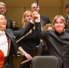 Yo Yo Ma and Esa-Pekka Salonen take bows after performing the Lutoslawski Cello Concerto with Chicago Symphony Orchestra 2013 credit Todd Rosenberg