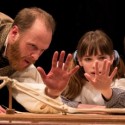 Darwin (Andrew White) shows his children (Caroline Heffernan and John Francis Babbo) the hand-like bones common to various creatures. (Liz Lauren)