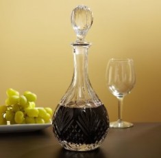 Wine-filled decanters add to a dinner party's festive mood.